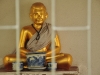 Why does the caged Buddha sing?